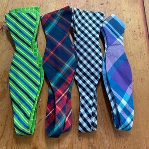 A bundle of 4 adjustable bow ties.